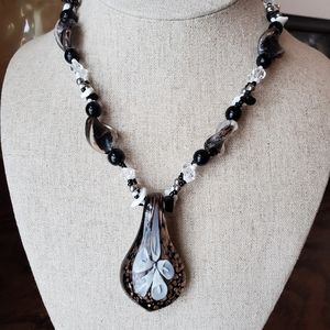 beaded necklace with glass pendant